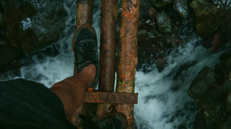 Person or group engaged in an exciting outdoor adventure, such as hiking, climbing, or exploring rugged terrain.