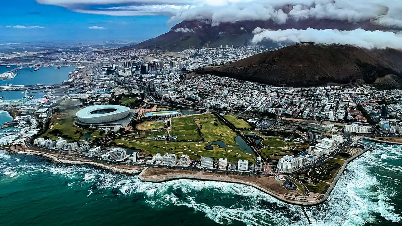 Table Mountain and the Cape Town cityscape viewed from above, one of the best places to visit in Africa for scenic beauty and culture.