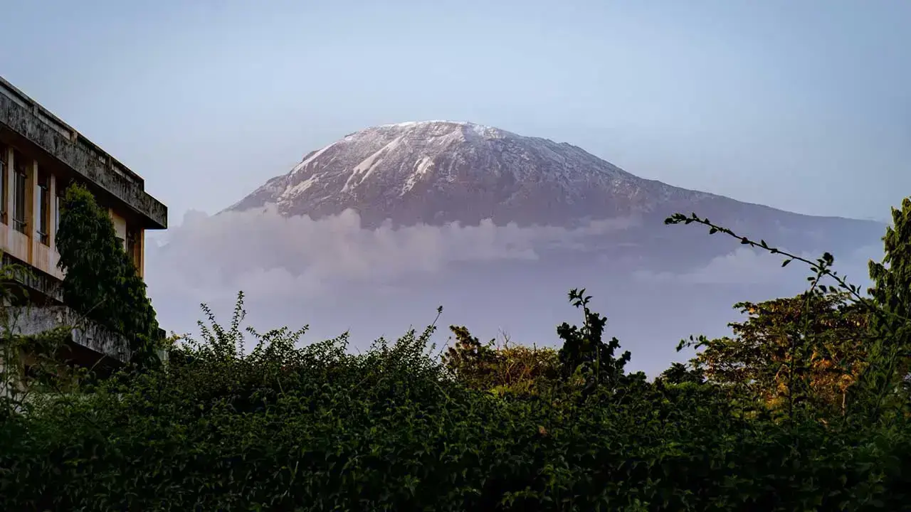 Breathtaking view of Mount Kilimanjaro at sunrise, a top destination in Africa for adventure and trekking.